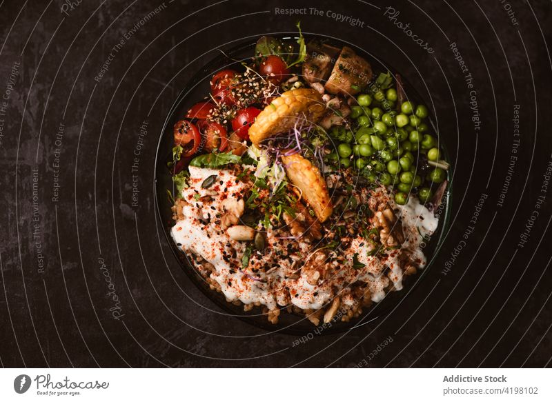 Delicious vegetarian dish with assorted vegetables and mushrooms asian food meal dinner lunch menu bowl cherry tomato sweet potato zucchini spaghetti nest