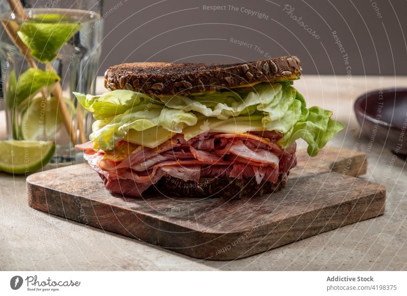 Healthy sandwich with salad leaves and bacon lettuce bread crunch toast appetizing board wooden nutrition restaurant yummy culinary tasty crispy nutrient rye