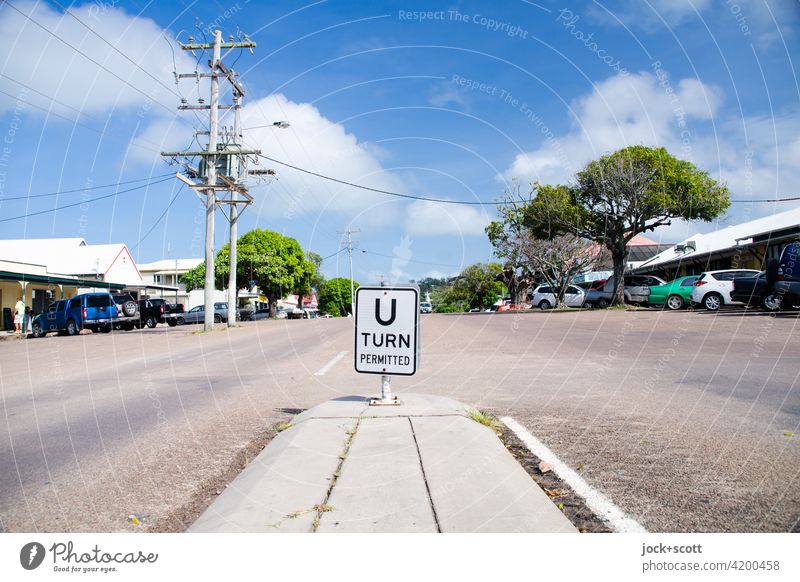 Douglas St. and the turnaround Turnaround allowed hairpin bend Street refuge Traffic infrastructure Lane markings Sunlight Calm Thursday Island Australia Word