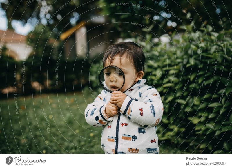 Child playing with magnifying glass childhood 1 - 3 years Caucasian Playing Magnifying glass Life Childhood memory Leisure and hobbies Lifestyle Toddler