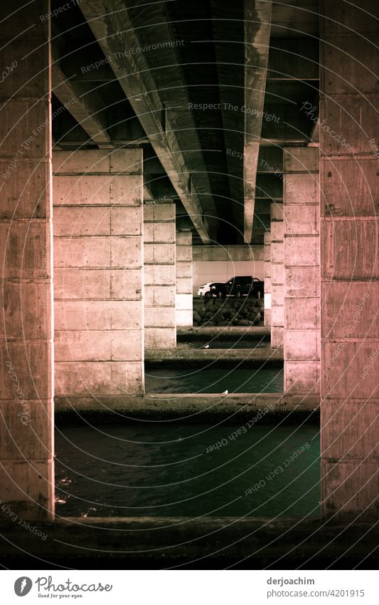 An extraordinary garage. Under a bridge. Illuminated by the sun. Garage Light Architecture Shadow Wall (building) Deserted Building Exterior shot Wall (barrier)