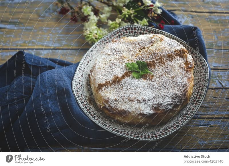 Delicious moroccan pastilla with cinnamon powder on plate cake moroccan food arabic food dinner lunch spice ramadan holiday dry aromatic seasoning chicken