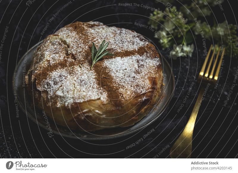 Delicious moroccan pastilla with cinnamon powder on plate cake moroccan food arabic food dinner lunch spice ramadan holiday dry aromatic seasoning chicken