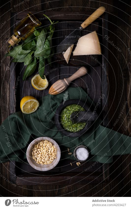 Ingredients for pesto sauce recipe ingredient cheese basil lemon nut oil food tradition set cuisine arrangement italian fresh culinary gourmet kitchen