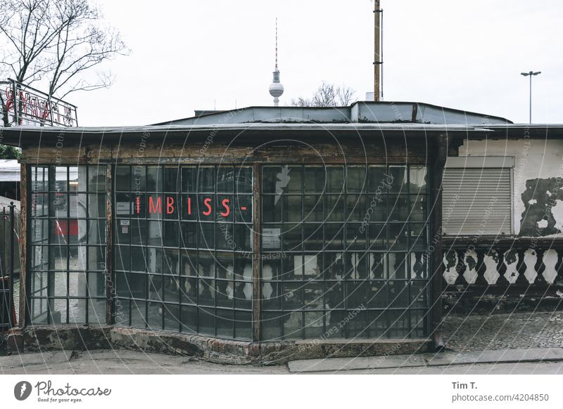 an old snack bar in the Prenzlauer Allee Television tower Berlin Prenzlauer Berg Snack bar Downtown Town Capital city Old town Deserted Exterior shot Day