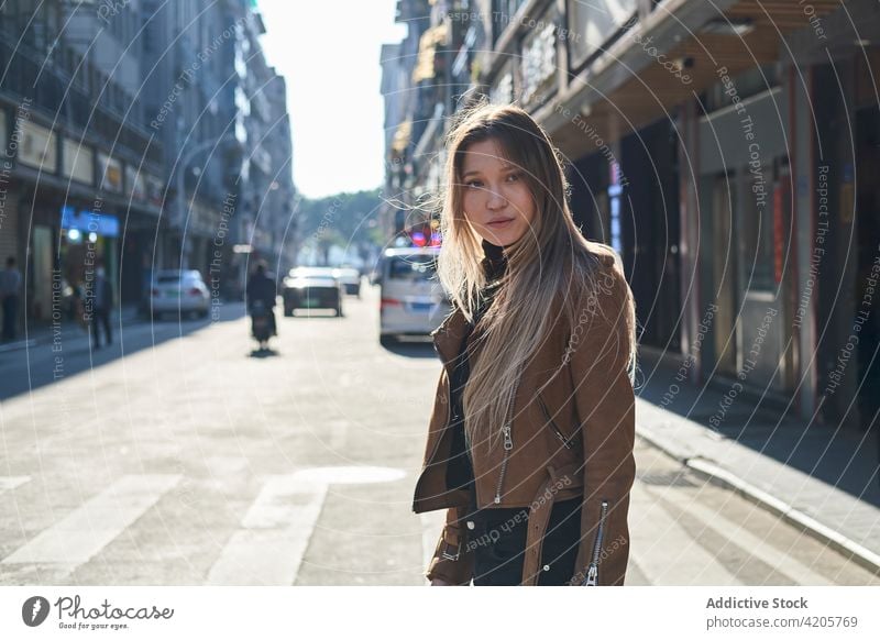 Young girl walking around Chinese downtown woman Chinatown urban Asia Russian girl alone beautiful blond blue eyes city city life cityscape day elegant female