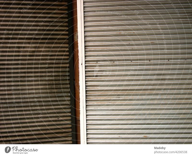 Metal roller shutters with corrugated profile in a large bazaar in Bursa, Turkey Roller shutter Profile Steel profile profile steel Corrugated sheet iron Iron