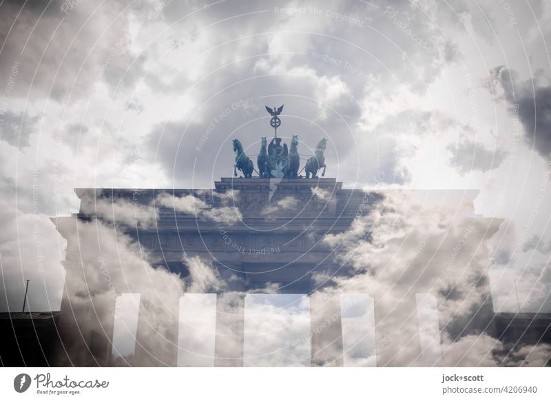 Clouds over Brandenburg Gate with commemorative colors Landmark Fantastic Experimental Double exposure Illusion Surrealism Reaction Pariser Platz Berlin Sky