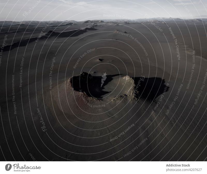 Volcanic crater in mountainous terrain volcanic highland nature cloudy sky formation weather iceland rough amazing landscape scenic breathtaking picturesque