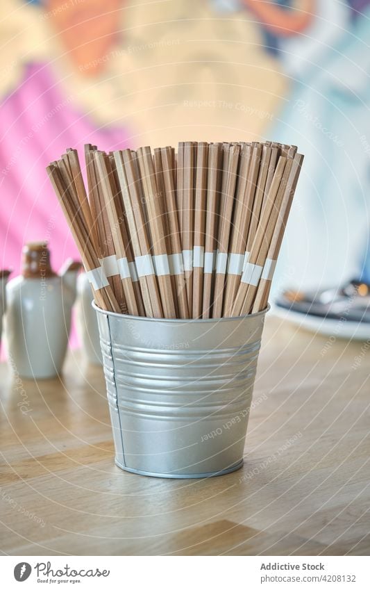 Chopsticks Ready to be Used chopsticks table restaurant prepared japanese restaurant front view asian set background chinese bamboo wooden object interior