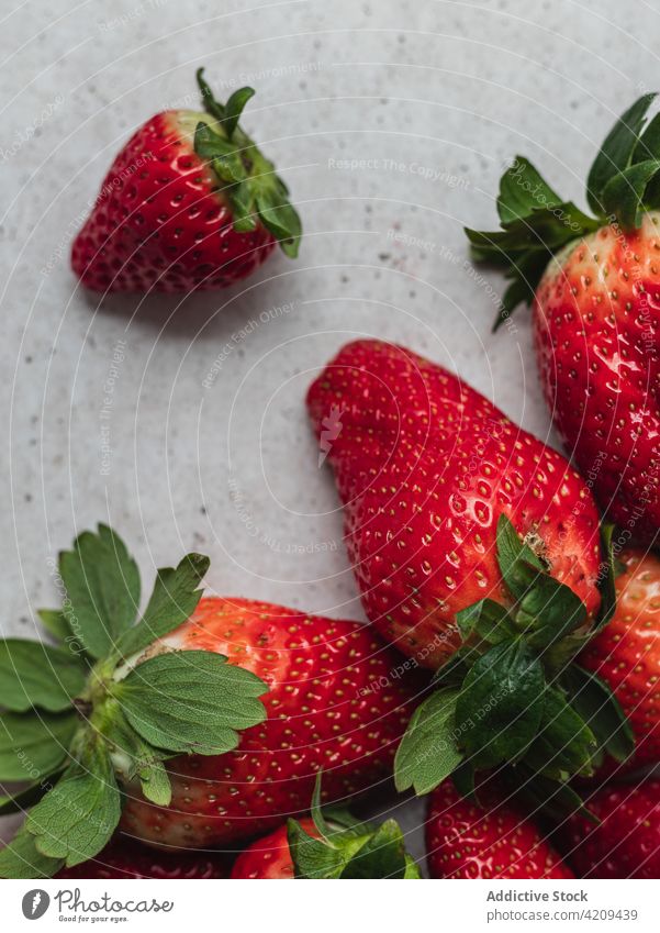 Ripe strawberries placed on table strawberry pile fresh harvest sweet treat delicious tasty healthy food kitchen yummy nutrition vitamin ripe natural appetizing