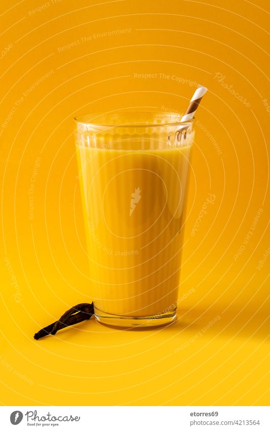 Delicious vanilla milkshake in glass beverage breakfast cold copyspace dairy delicious drink energy flavor food fresh refreshment straw sugar summer sweet