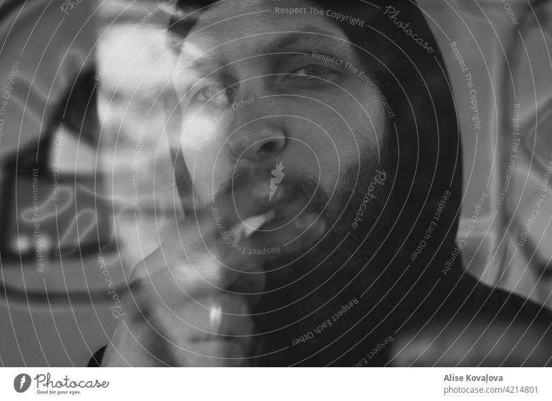 trough the glass there’s a smoking man Portrait photograph blackandwhite Shadow Man Smoking Youth (Young adults) Cigarette Human being Glass broken glass