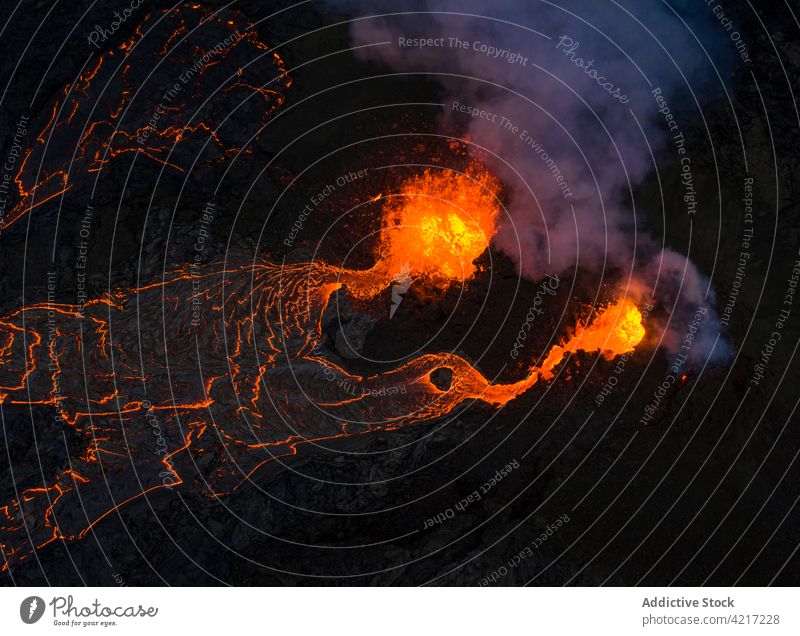 Fagradalsfjall volcano erupting in Iceland iceland lava magma smoke mountain red hot nature volcanic eruption crater active danger geology explosion fog fire