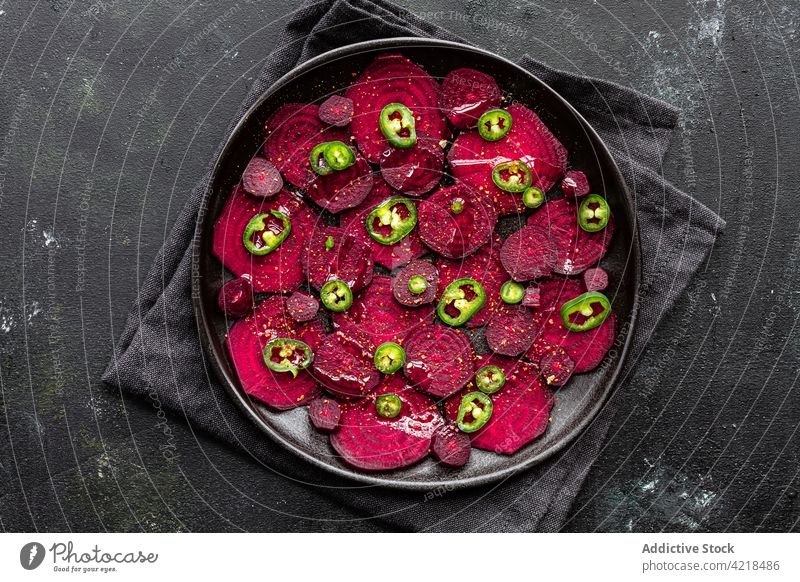 Sweet beetroot slices heaped on baking pan vegetable cut cook process bake jalapeno appetizing salad ripe ingredient recipe chili organic cuisine tasty raw