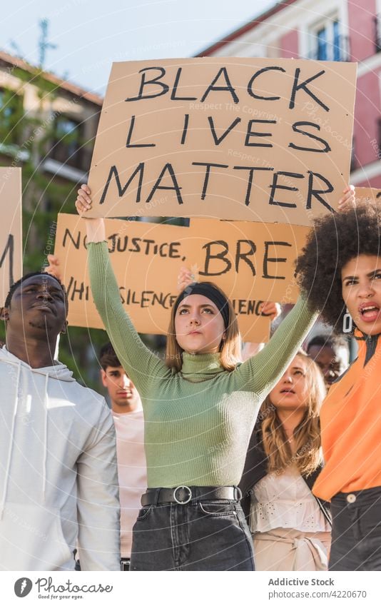 Diverse people during Black Lives Matter protest in city black lives matter crowd poster activist racism discriminate protester multiracial multiethnic diverse