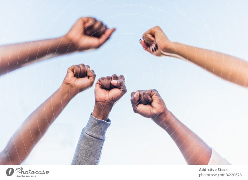 Crowd of black people with clenched fists during protest black lives matter fist up crowd clench fist arms raised sign together gesture blm african american