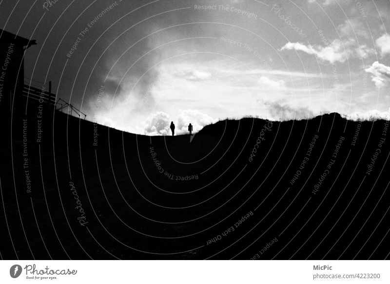 Thunderstorm moves in - two people in the mountains Storm Shadow Dark Threat Clouds Sky Gale Thunder and lightning Weather change Storm clouds Nature