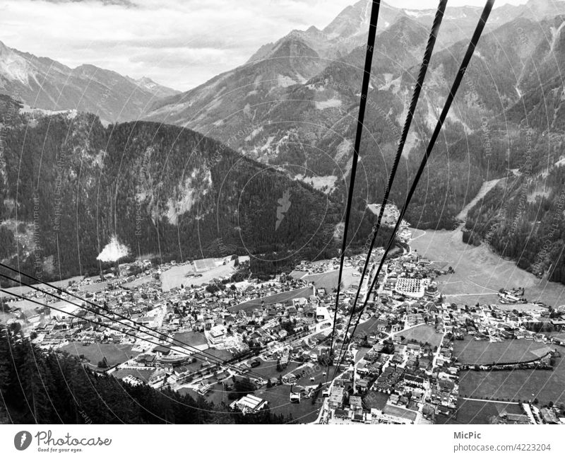 high up Cable car Vantage point View into the valley depth Fear of heights Rope Steel outlook Mountain Nature Valley Wire cable Panorama (View) Mayrhofen