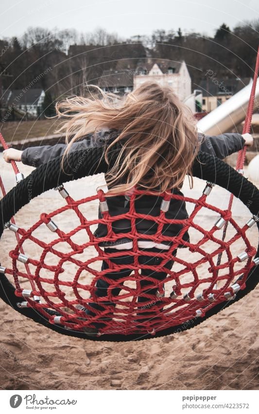 Girl on a swing To swing Child Infancy Playing Joy Exterior shot Colour photo Happy Happiness Human being Joie de vivre (Vitality) 3 - 8 years