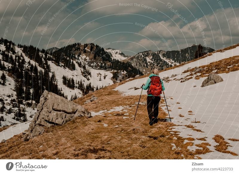 Young woman hiking on the Hochmiesing | Soinsee closeness to nature outdoor soinsee Hiking bavarian cell Upper Bavaria Alps mountains Spring Peak Sky Clouds