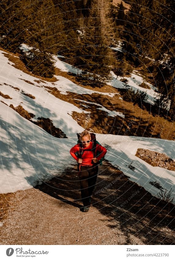 Young woman hiking on the Hochmiesing | Soinsee closeness to nature outdoor Hiking bavarian cell Upper Bavaria Alps mountains Spring Peak Sky Clouds warm colors