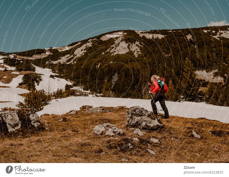 Young woman hiking on the Hochmiesing | Soinsee closeness to nature outdoor soinsee Hiking bavarian cell Upper Bavaria Alps mountains Spring Peak Sky Clouds