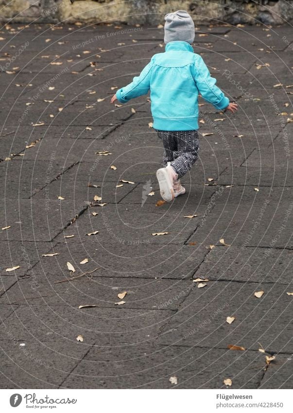 be in progress Child Parenting Infancy Girl Portrait of a young girl Girl`s face Street off Spring Walking Playing Effortless