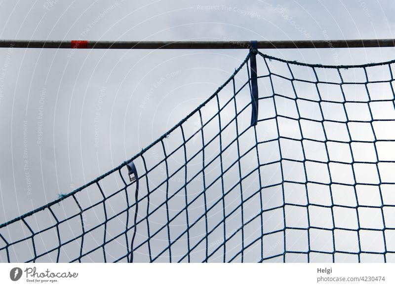 Spaces | Safety net on a metal bar for securing on a construction site Net Backup Construction site pole Metal Metal post Fastening Network Sky Clouds Light