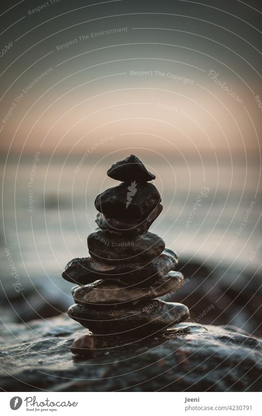 Harmony and balance harmony equilibrium stone stack stones Stack pile stacking Balance Spirituality Ocean Beach coast Sand Pebble beach Meditation Harmonious