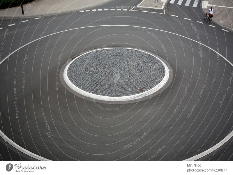 roundabout Traffic infrastructure Transport Round Traffic circle Circular Gray Circle Street Lanes & trails Gyroscope Paving stone Line Gloomy Road traffic