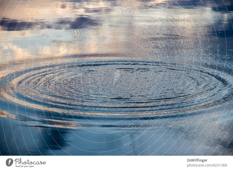 Circles on the water of a lake and sky reflection God Religion abstract aqua art backdrop background blue calm circle clean clear cloud color cool design