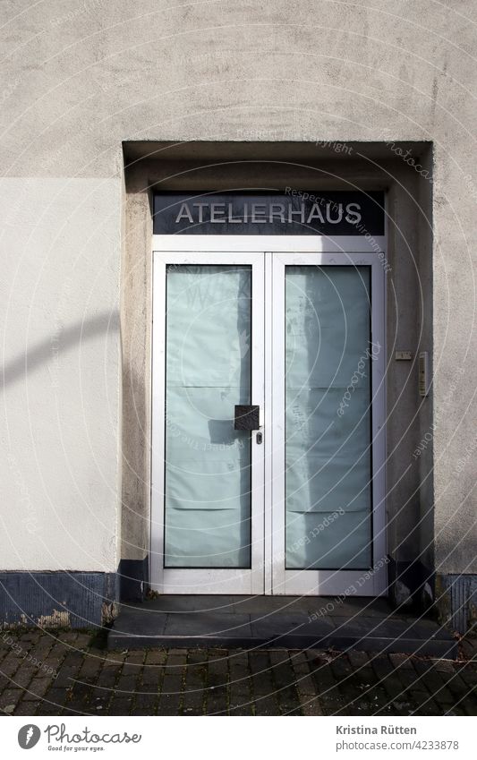 abandoned studio house door Entrance Glass door masked Lettering ateliers workshops studios rooms Room Artist art space art house too Closed forsake sb./sth.