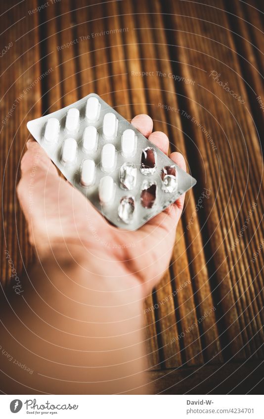 Man holding tablets in his hand Healthy Illness Sick medicine Health problem Medication Hand stop Medical treatment