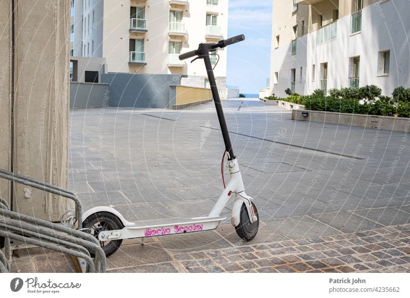 Electric scooter parked electric scooter vacation Lifestyle environmentally conscious Environment quiet Loading dock Technology Transport clean energy