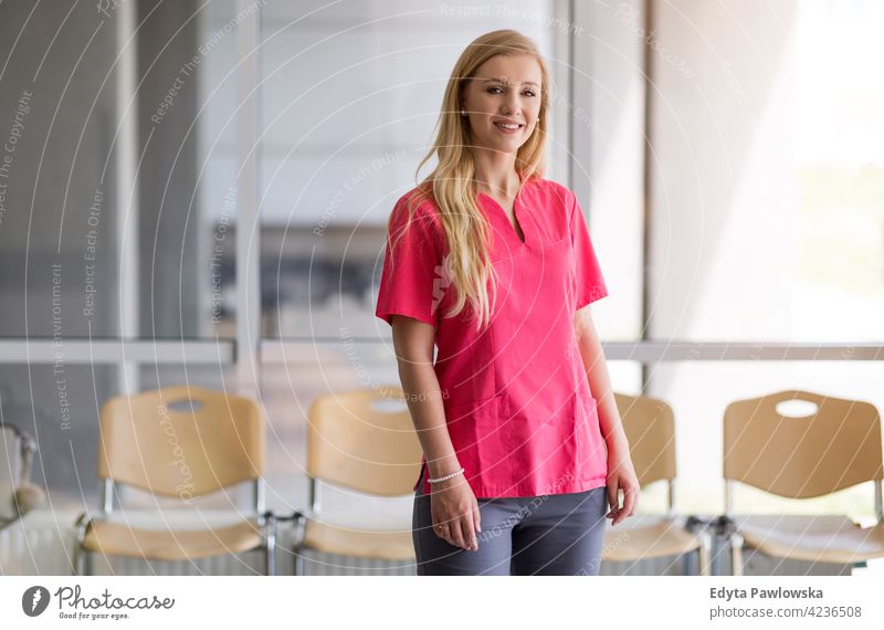 Portrait of a young female nurse in hospital healthcare medicine indoors equipment clinic recovery help medical patient ward therapy working job occupation