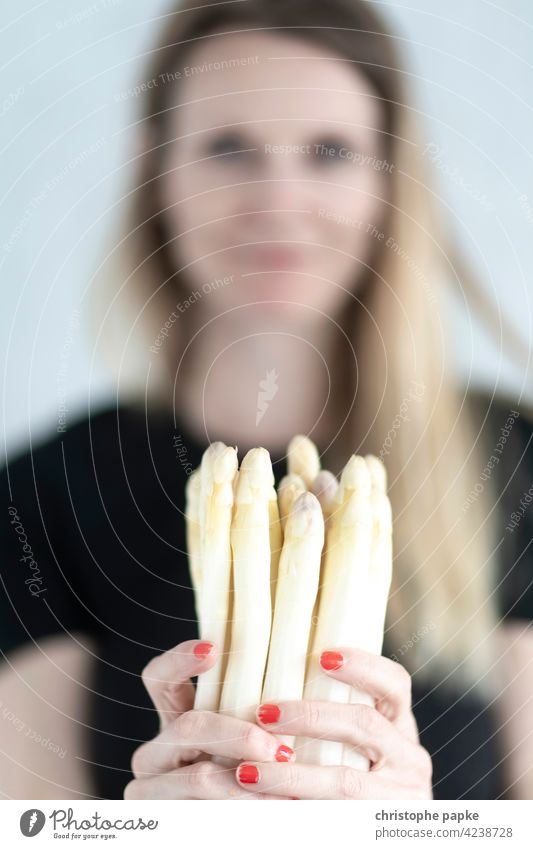 Woman holding asparagus bunch in her hands Asparagus Bunch of asparagus Multiple Asparagus season food products Fresh Nutrition Food Vegetarian diet