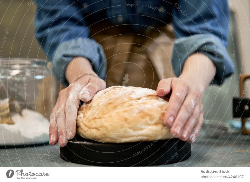 Crop baker preparing bread with flour in kitchen wheat fresh culinary recipe crust woman aroma baked prepare cook rustic ingredient natural whole nutrition