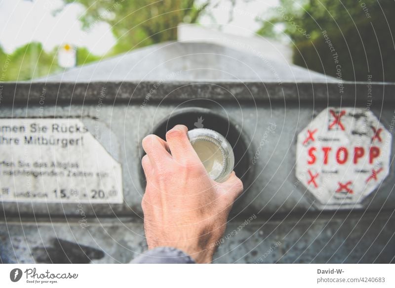 Disposal of used glass Glass bin Glass for recycling Trash Dispose of waste disposal Waste utilization Man Hand Throw away Recycling