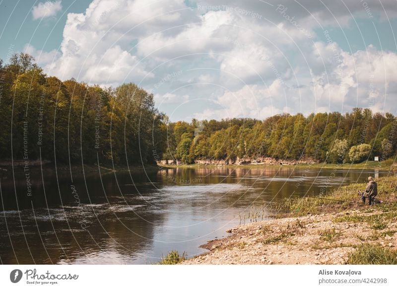 Landscape by a river River Nature Fishermen clouds daytime Daylight landscape Sky Water Colour photo Environment River bank Tree Dolomite bank Reflection Forest