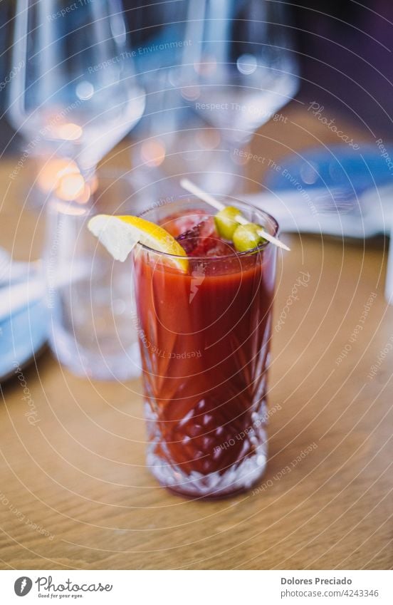 Bloody Mary cocktail on the table of a European restaurant alcohol alcoholic background bar beverage bloody bloody mary bloody mary drink bokeh brunch cocktails