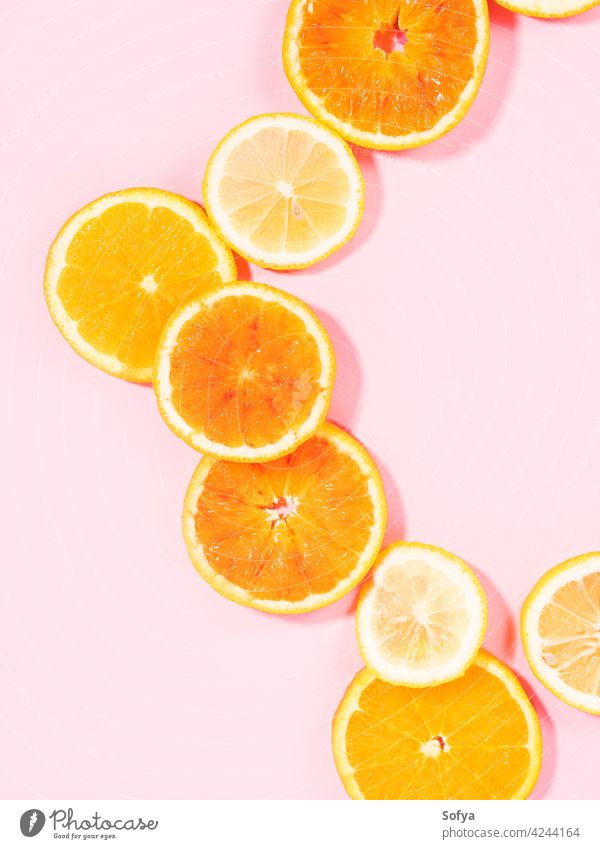 Colorful orange citrus slice fruit texture background on pastel pink fresh yellow white pastel color food pattern cut flatlay vitamin flat lay sweet organic