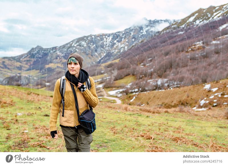 Calm woman hiking in mountain valley traveler hike explore walk adventure tourism journey nature slope peaks of europe picos de europa spain freedom calm dream