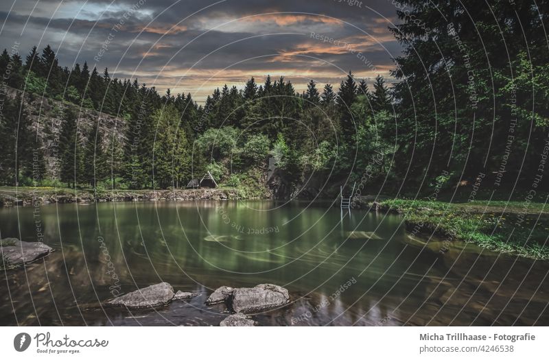 Mountain lake at the Ebertswiese / Thuringian Forest Thueringer Wald Lake Water trees Hut Rock Wall of rock stones bank mountain lake Sky Clouds Sun Landscape