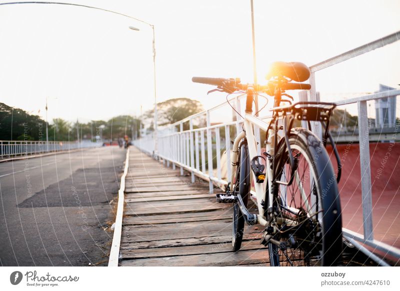 bicycle parking on side bridge Bicycle Parking Bridge Bridge railing transportation bike outdoor urban lifestyle city summer vehicle riding vintage wheel road