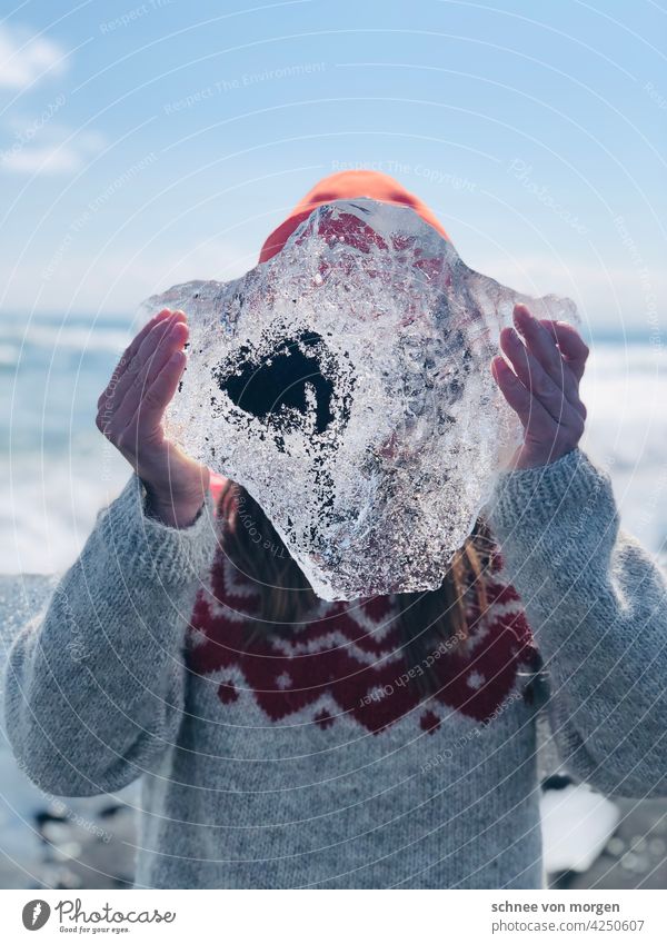 Iceland ice chunk in hand Climate change Water Nature Ocean Sun Sweater style Landscape Colour photo Environment Glacier Deserted Jökulsárlon Elements Ice floe