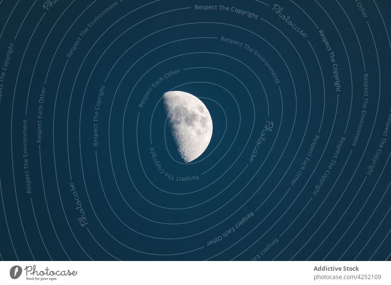 Waxing Gibbous moon shining on blue sky at night satellite astronomy astrology universe galaxy glow illuminate crater cosmos cosmic lunar solar science contrast