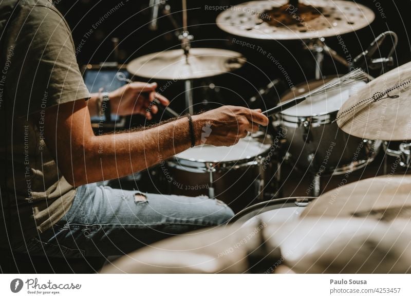 Close up musician playing drums Drum Drum set Drummer Musician Musical instrument Rhythm Interior shot Drumstick Beat Concert Sound sticks Man Entertainment