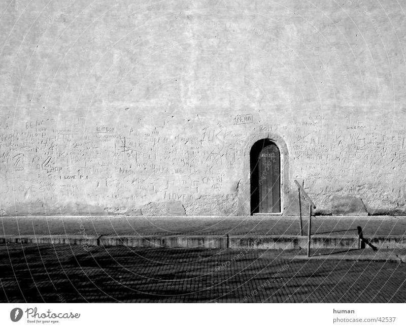 church door Wall (barrier) Architecture Religion and faith Door engraved Characters carved Black & white photo Structures and shapes Handrail