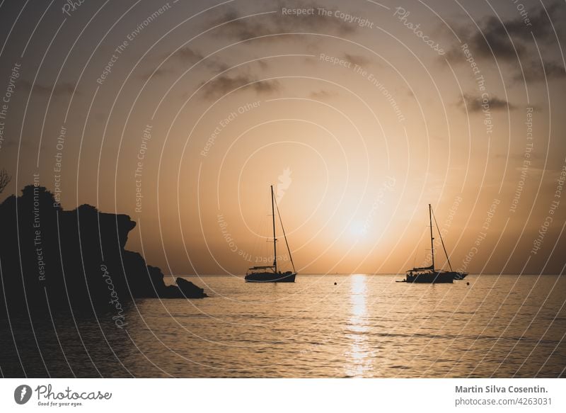 The end of the day in Cala Saona beach, Formentera, Spain background balearic bay beautiful blue boat boats cala cala saona coast coastline europe exotic